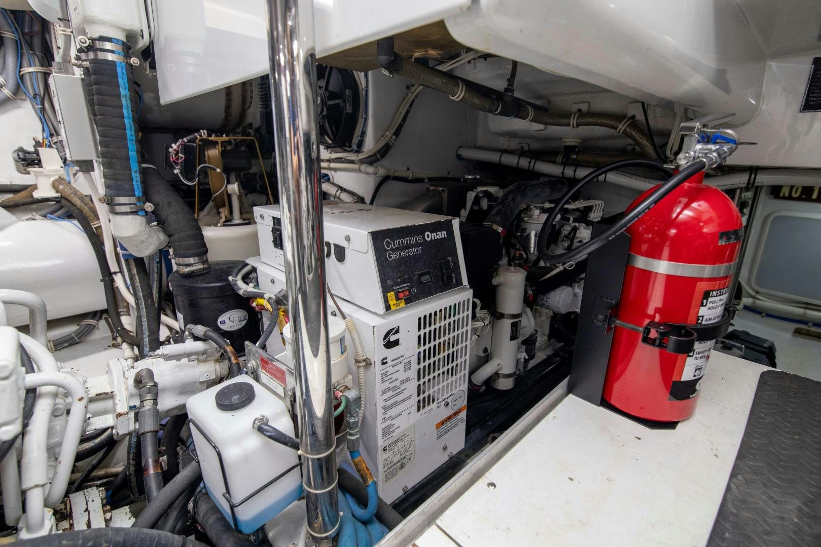 a red and white machine aboard IONA LOUISE Yacht for Sale
