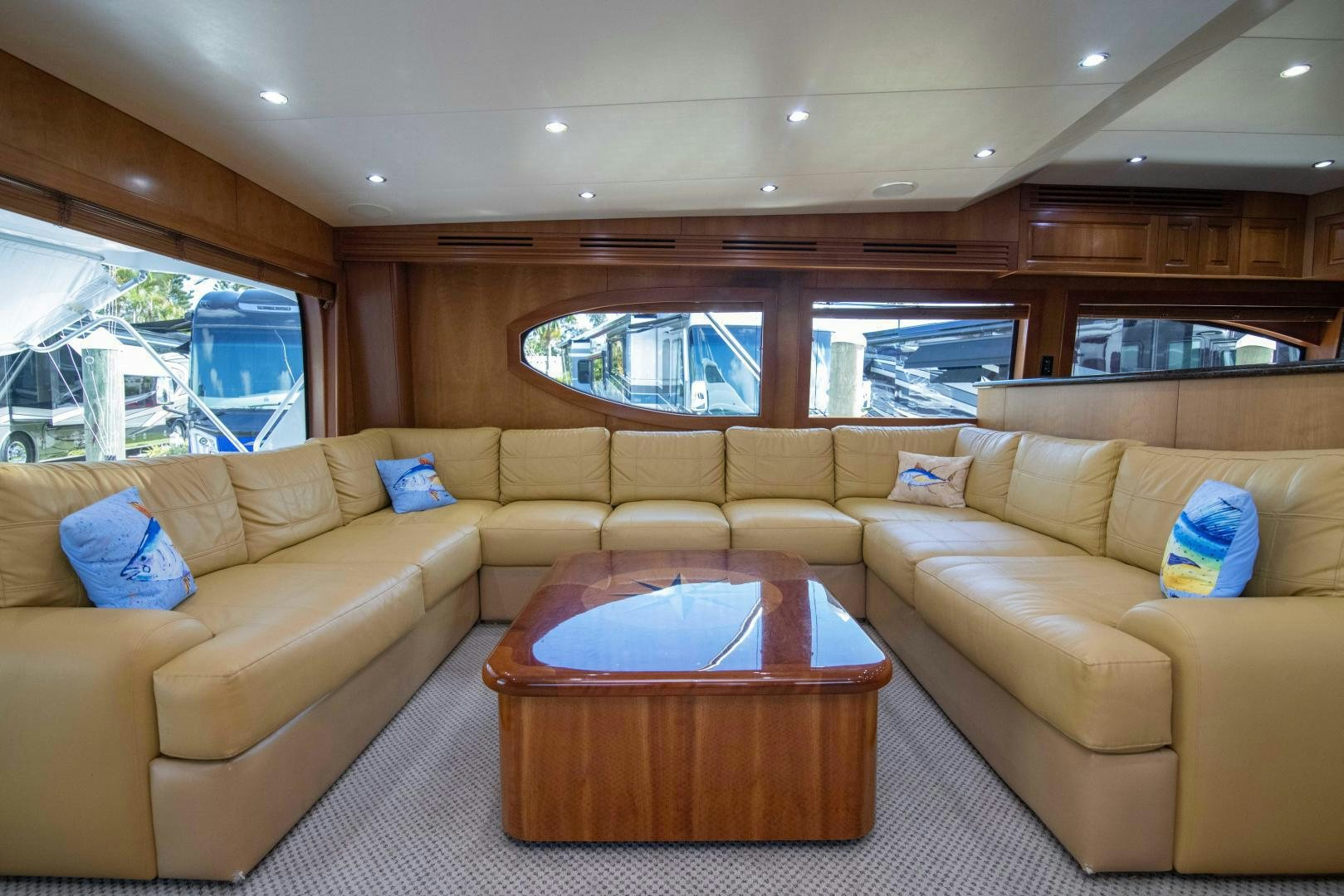 a living room with a couch and a table aboard IONA LOUISE Yacht for Sale