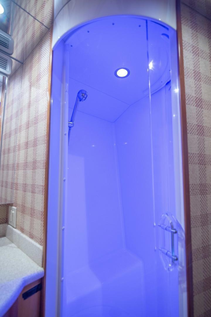 a shower with a glass door aboard IONA LOUISE Yacht for Sale