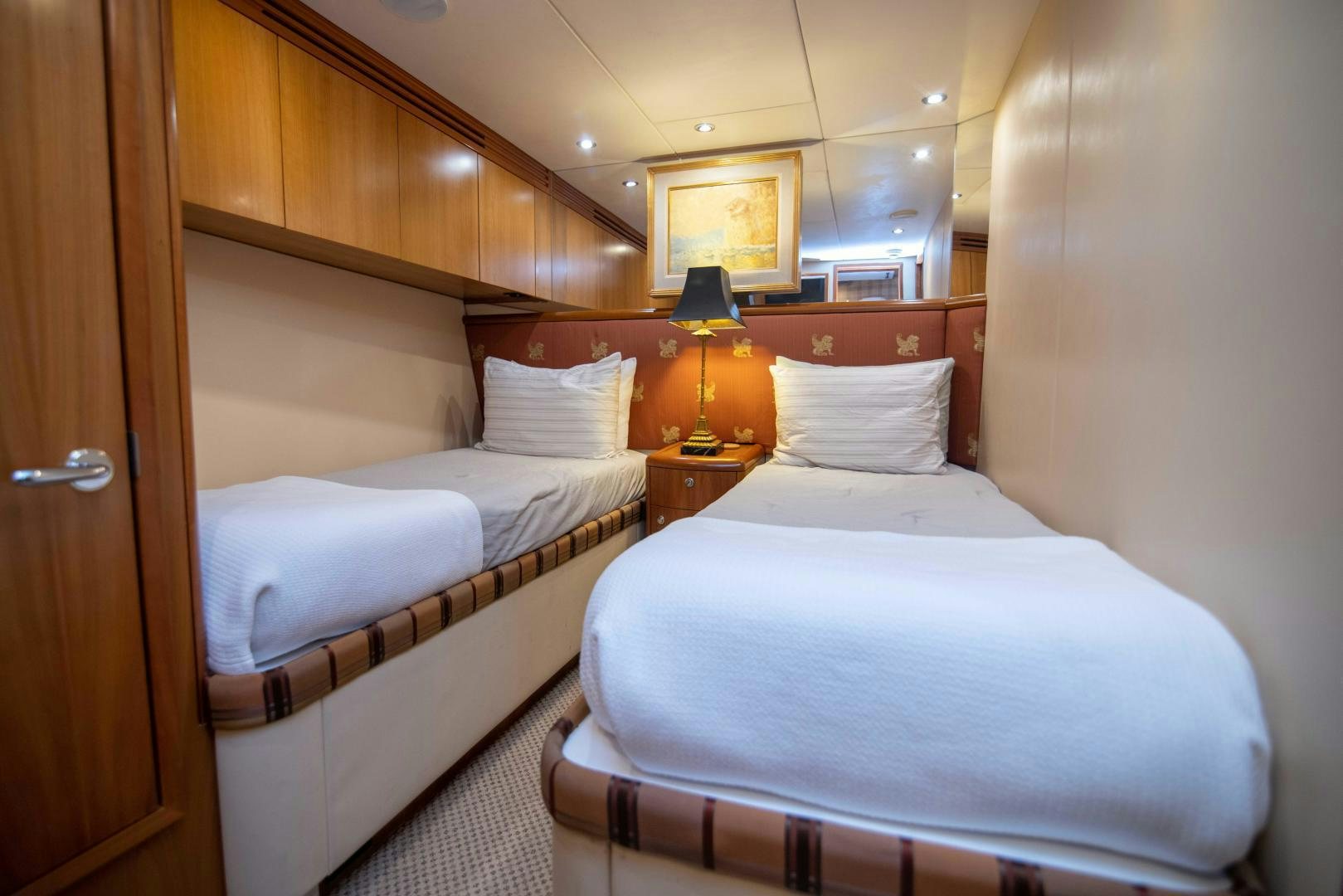 a couple of beds in a room aboard IONA LOUISE Yacht for Sale