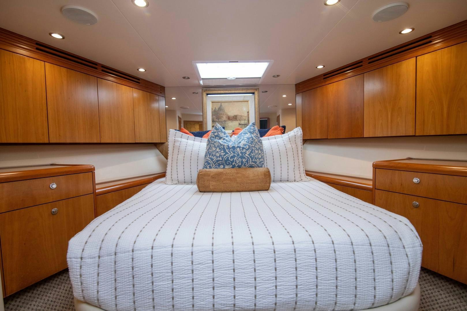 a large bedroom with a large bed aboard IONA LOUISE Yacht for Sale