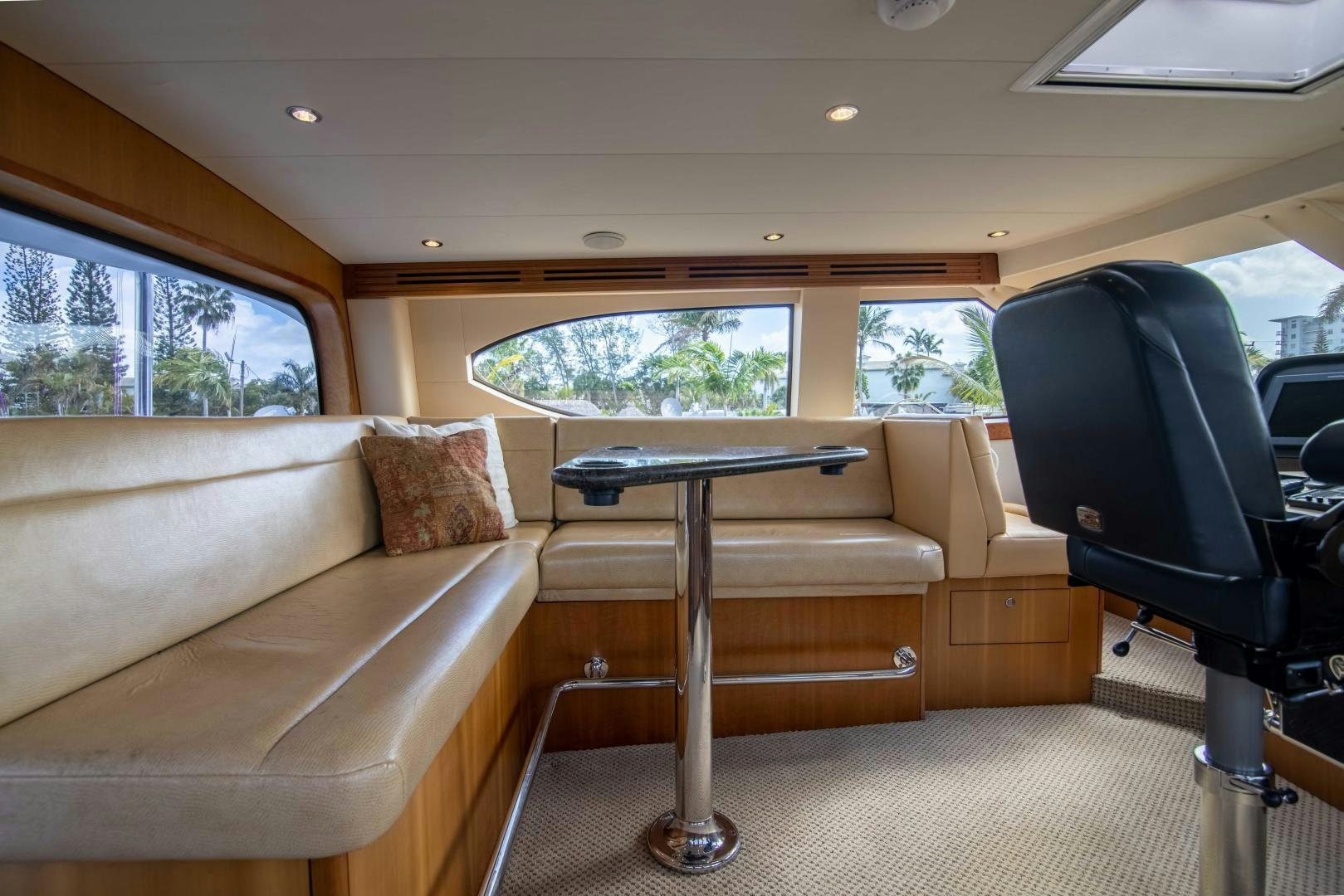 a car with a table and chairs aboard IONA LOUISE Yacht for Sale
