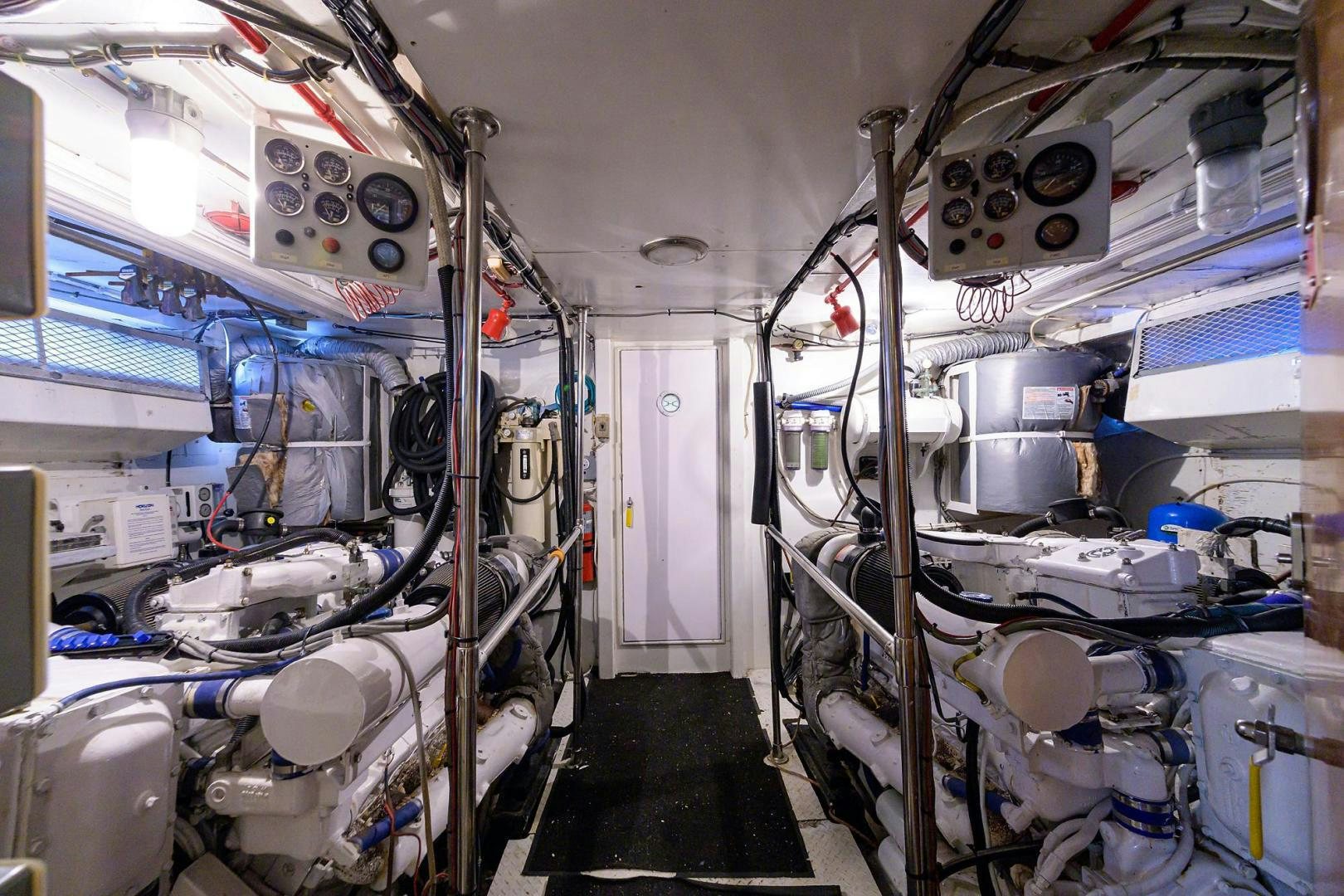 a room with a machine aboard CHRISTIE LEE Yacht for Sale