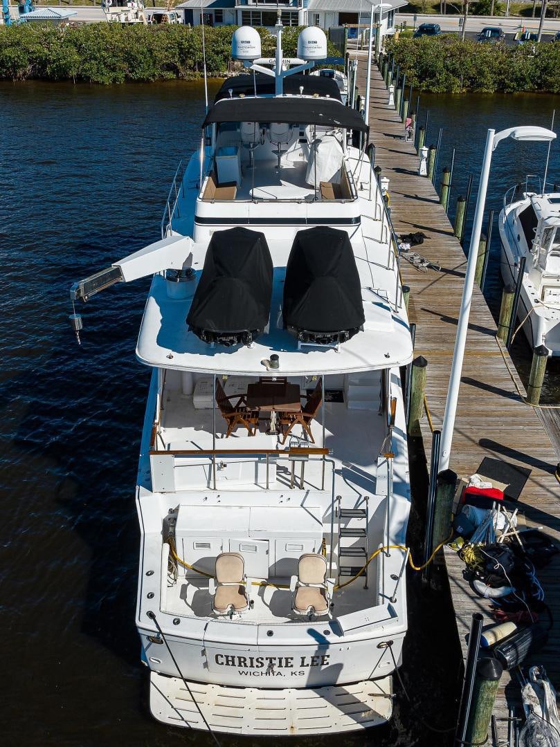 a boat docked at a pier aboard CHRISTIE LEE Yacht for Sale