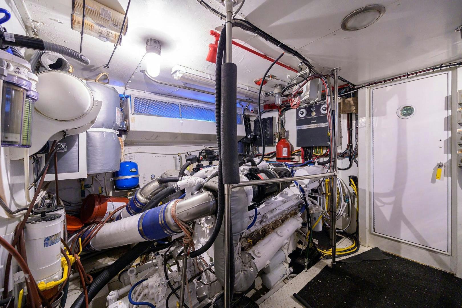 a room with machinery and pipes aboard CHRISTIE LEE Yacht for Sale