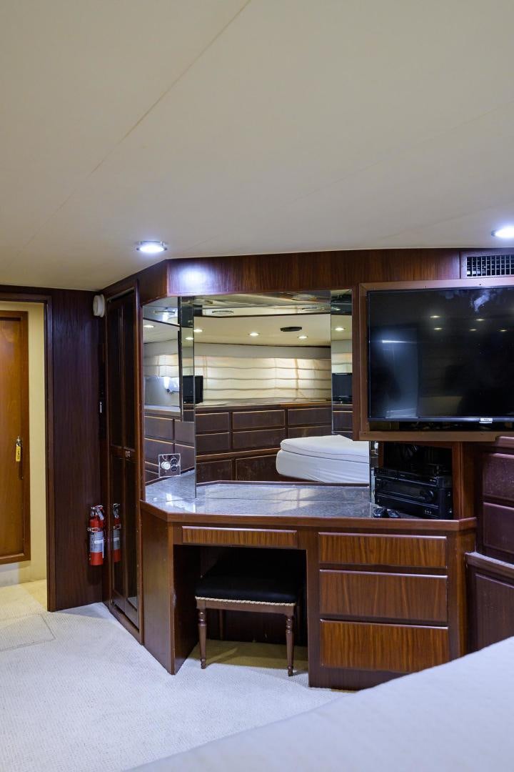 a room with a tv and a counter aboard CHRISTIE LEE Yacht for Sale