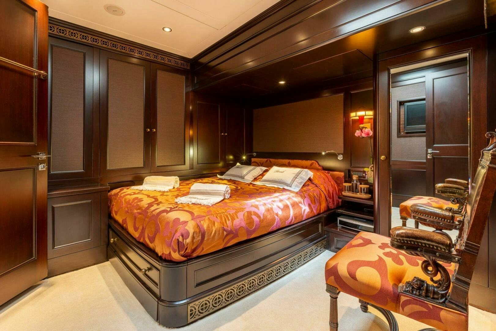 a bed in a room aboard GWEILO Yacht for Sale
