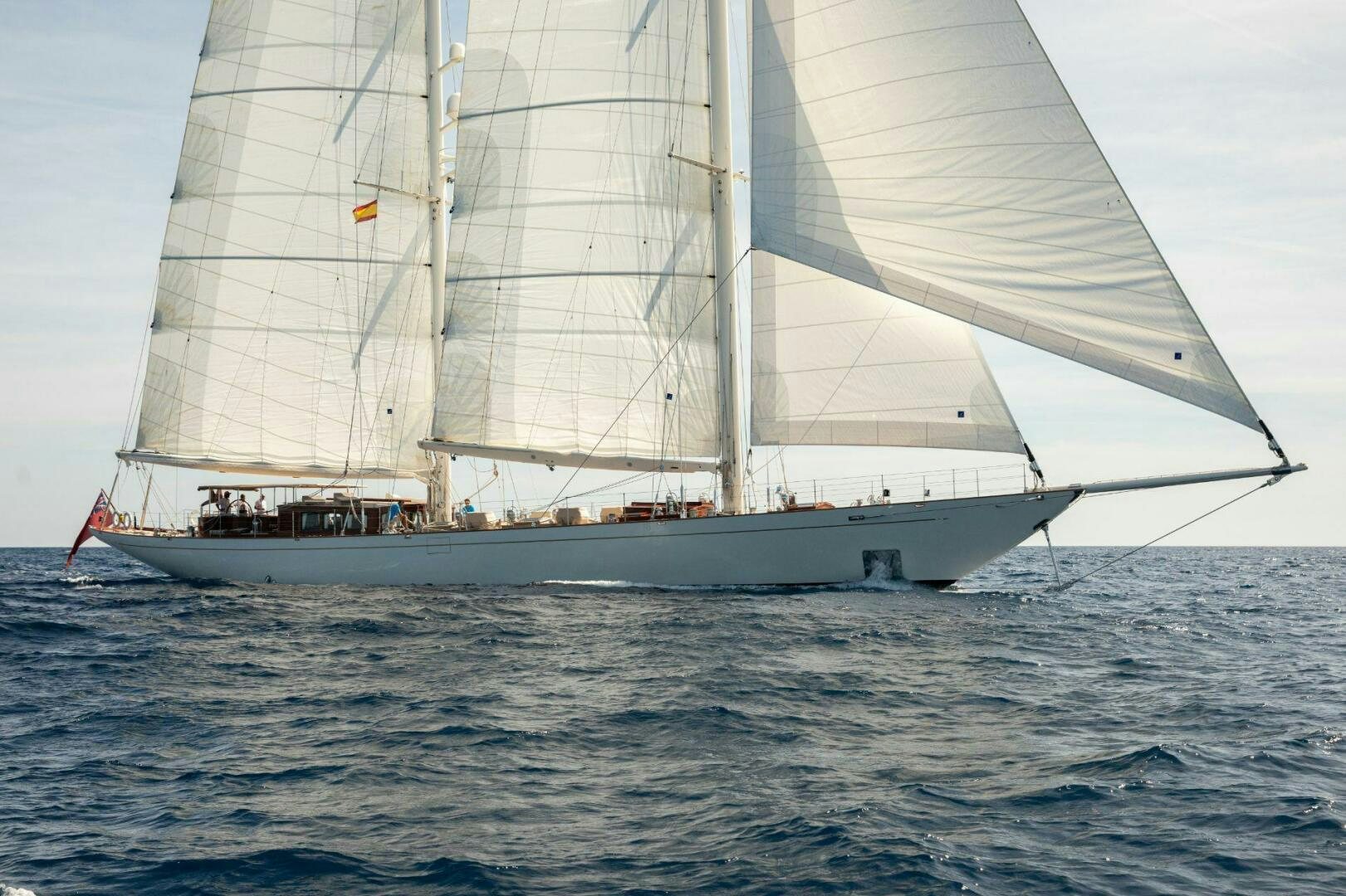 a large sailboat on the water aboard GWEILO Yacht for Sale