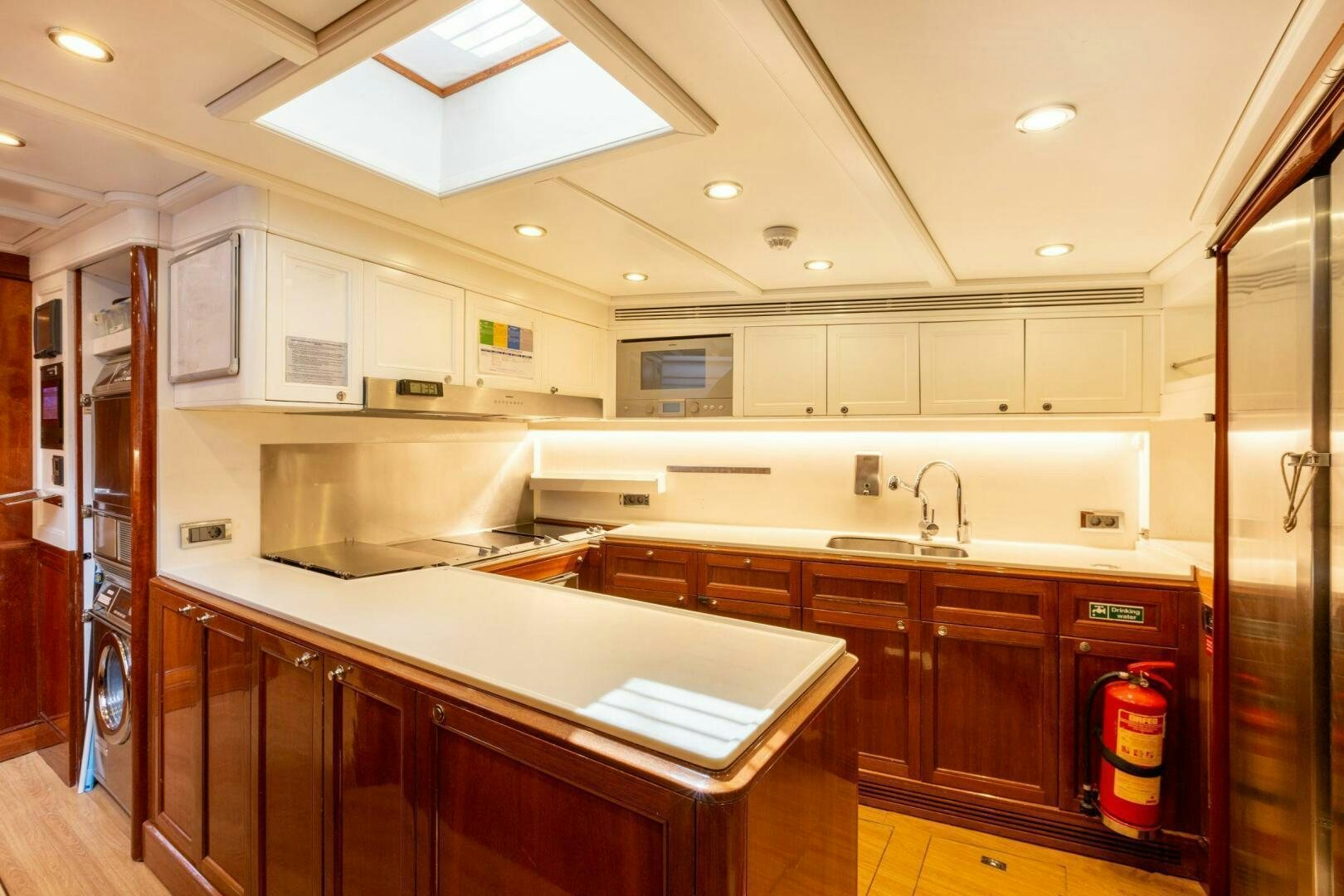 a kitchen with a countertop aboard GWEILO Yacht for Sale