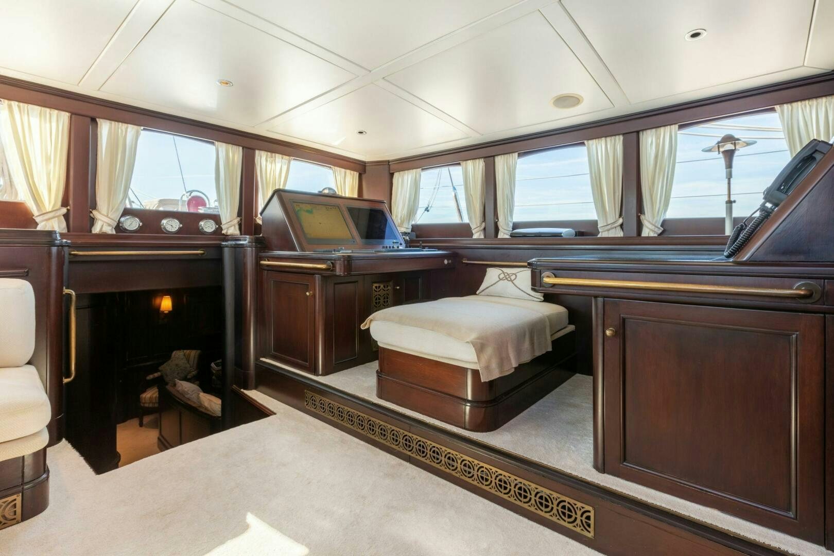 a large room with a piano and a piano aboard GWEILO Yacht for Sale