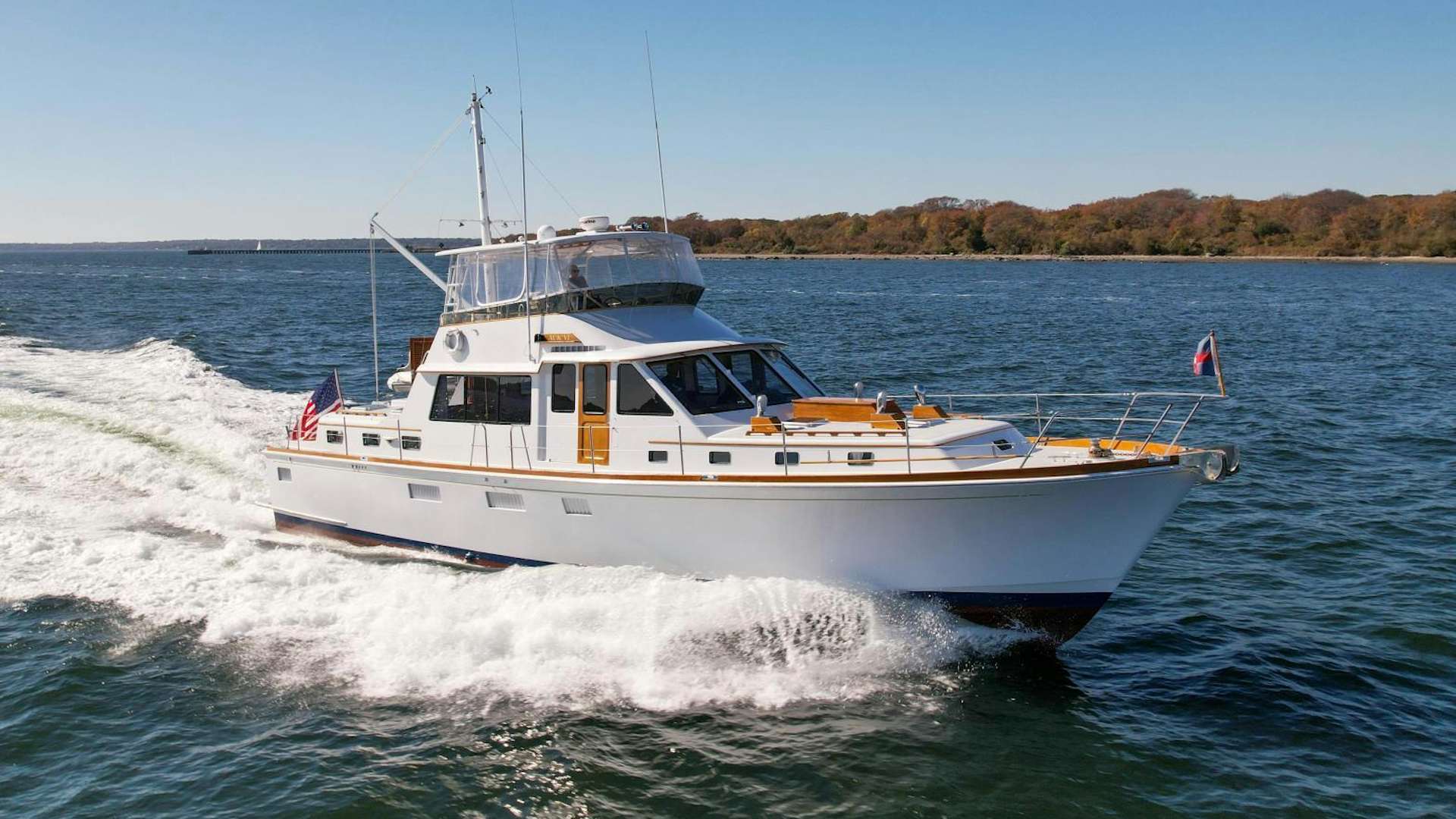 a boat on the water aboard AUK VI Yacht for Sale