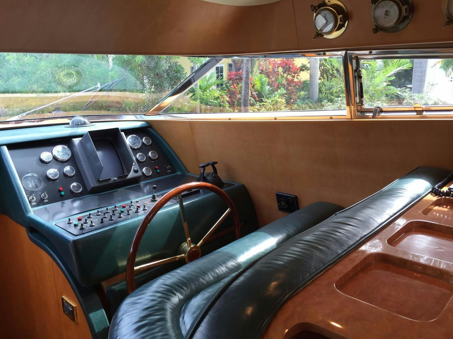 a car with a radio aboard UNZIPPED Yacht for Sale