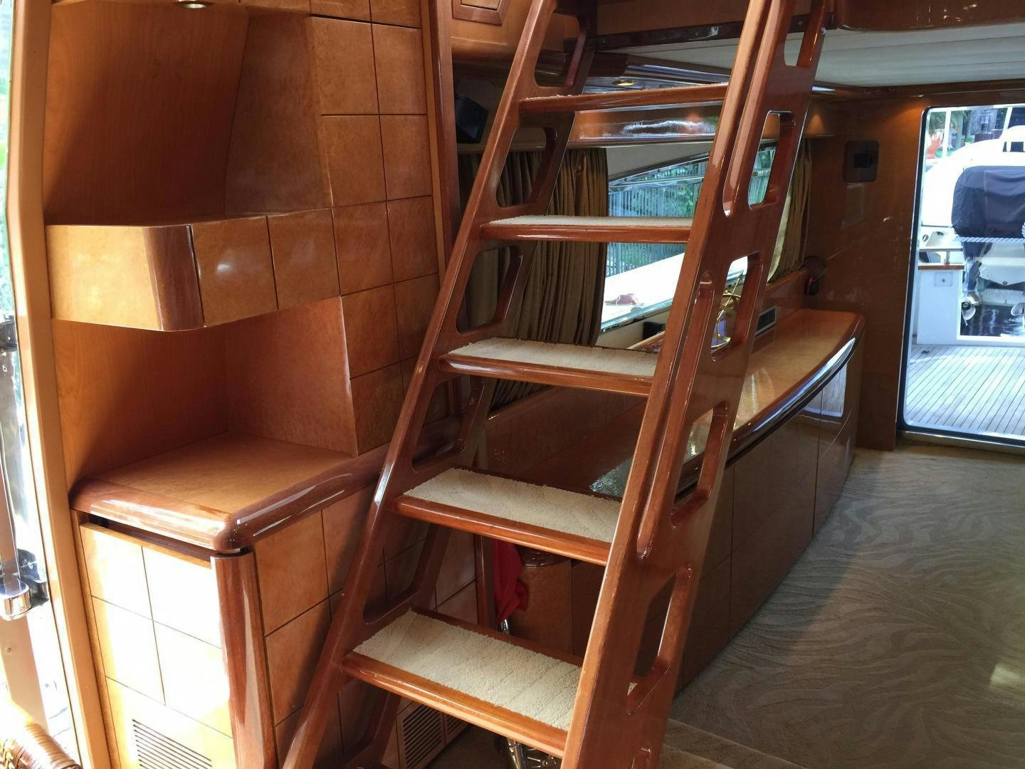 a wooden bunk bed aboard UNZIPPED Yacht for Sale
