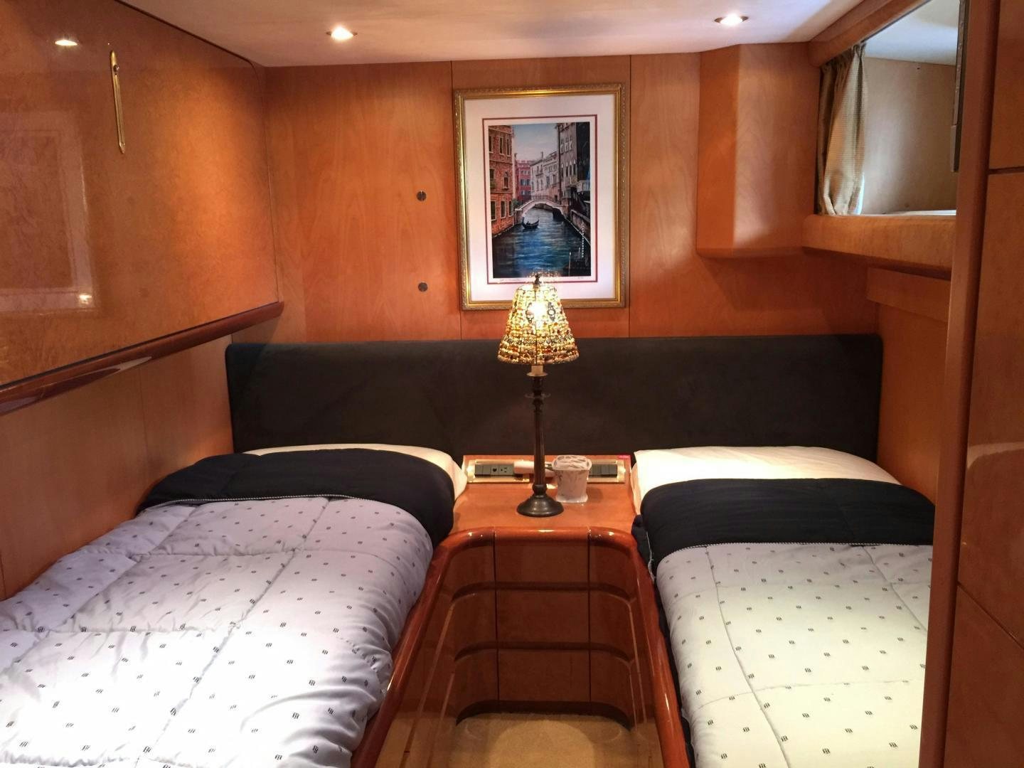 a room with two beds aboard UNZIPPED Yacht for Sale