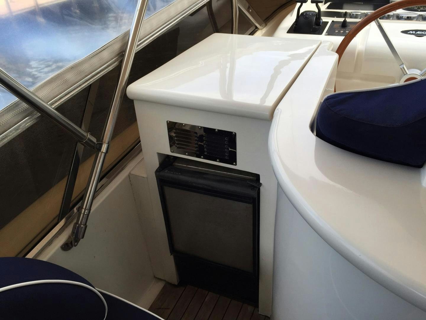 a white sink with a black lid aboard UNZIPPED Yacht for Sale