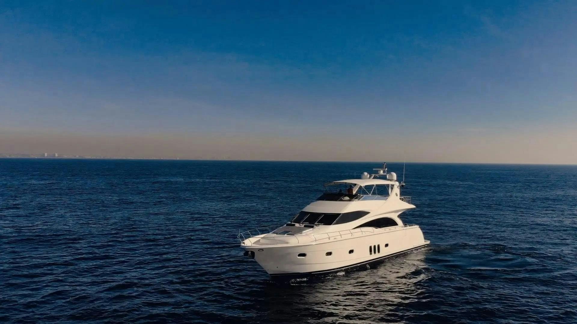 a white yacht in the water aboard STARTING OVER Yacht for Sale