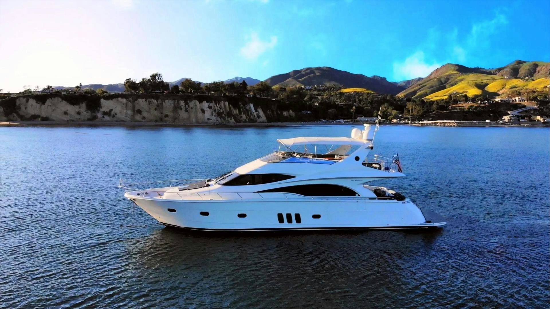a white yacht on the water aboard STARTING OVER Yacht for Sale
