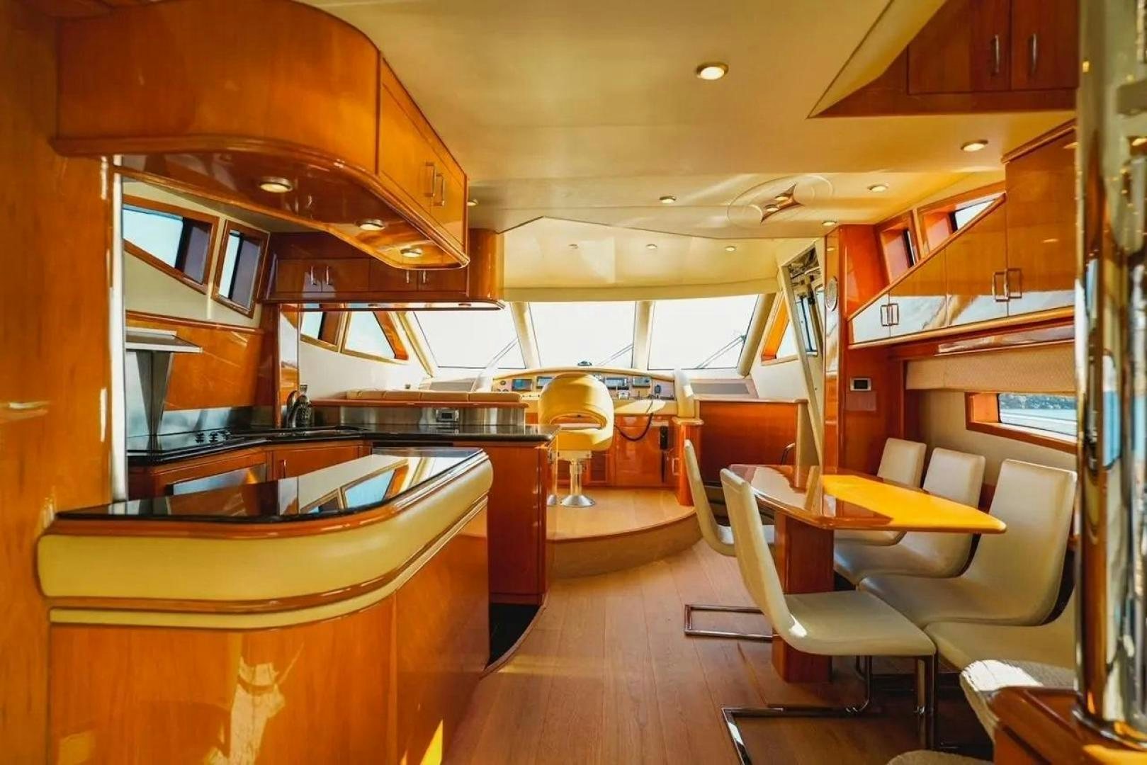 a room with a table and chairs aboard STARTING OVER Yacht for Sale