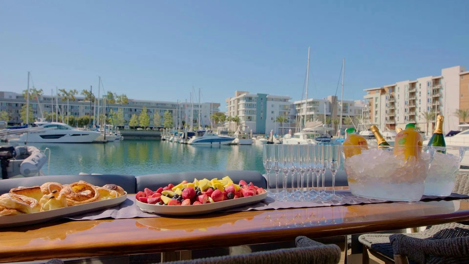 a table with food on it aboard STARTING OVER Yacht for Sale