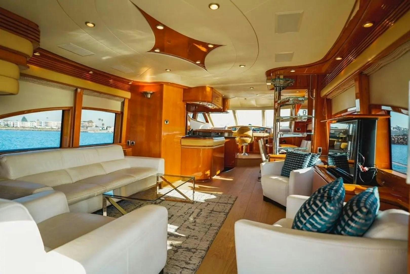 a living room with a large window aboard STARTING OVER Yacht for Sale