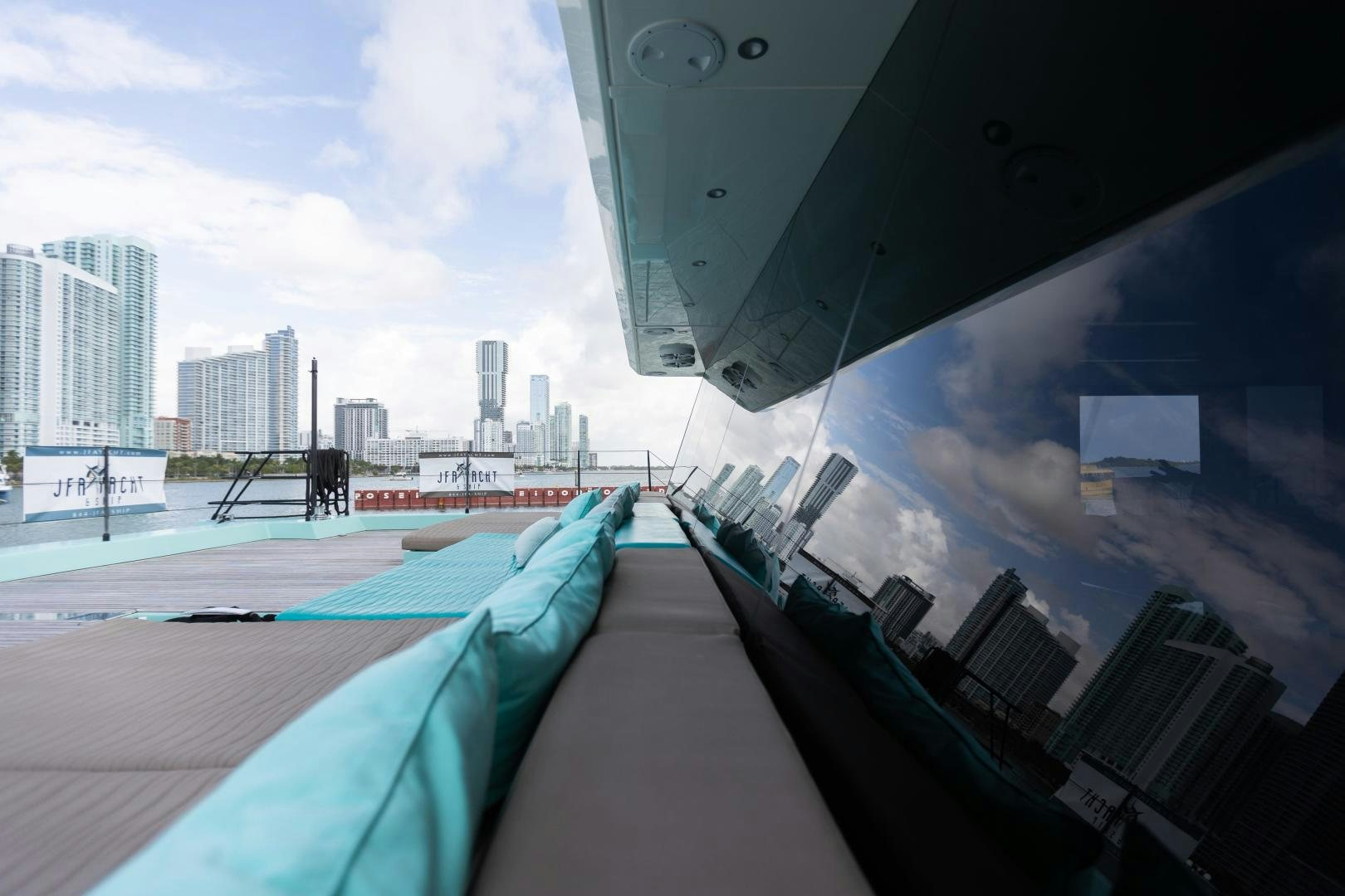 a pool with a city in the background aboard ROCK STAR 2.0 Yacht for Sale