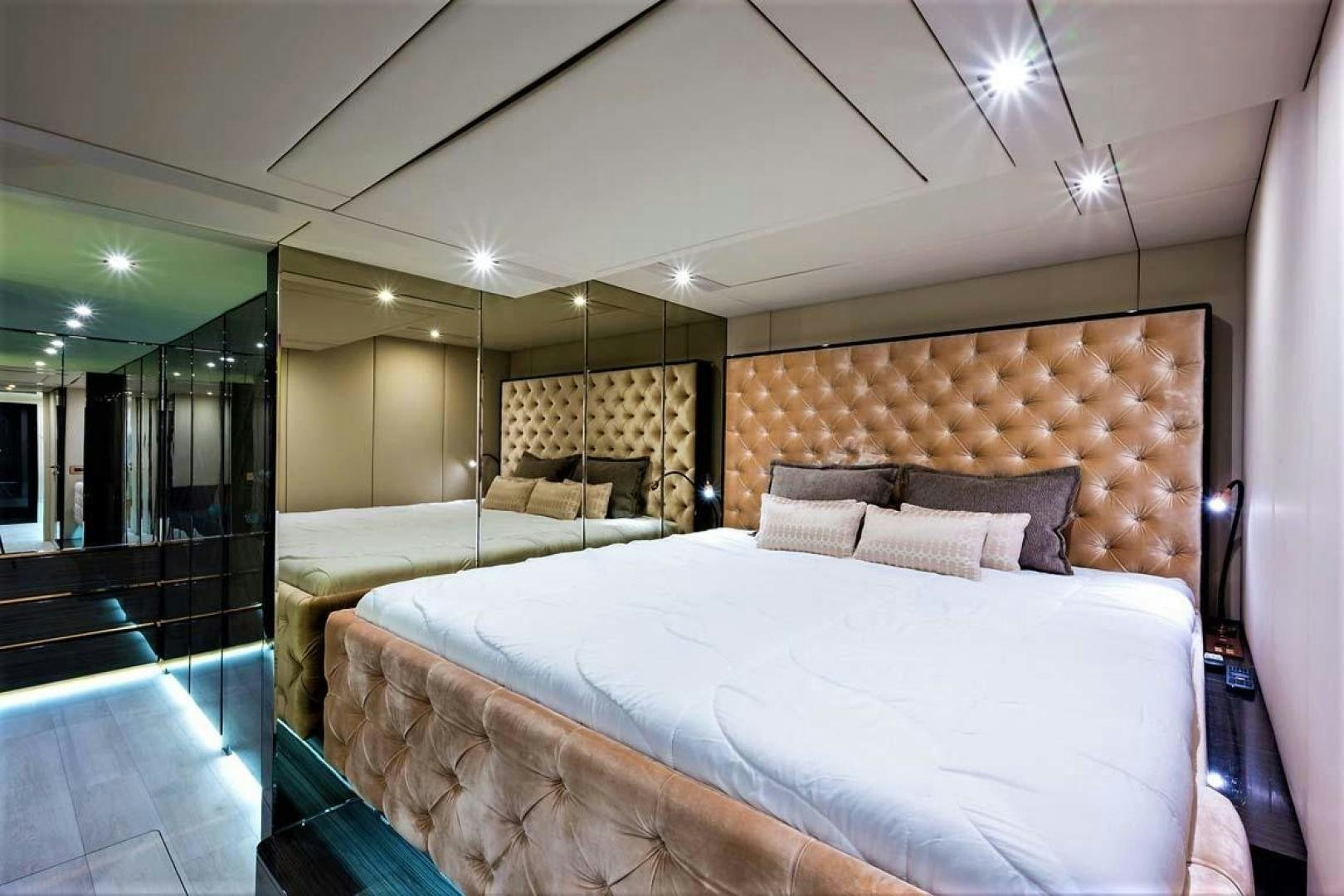 a room with two beds aboard ROCK STAR 2.0 Yacht for Sale