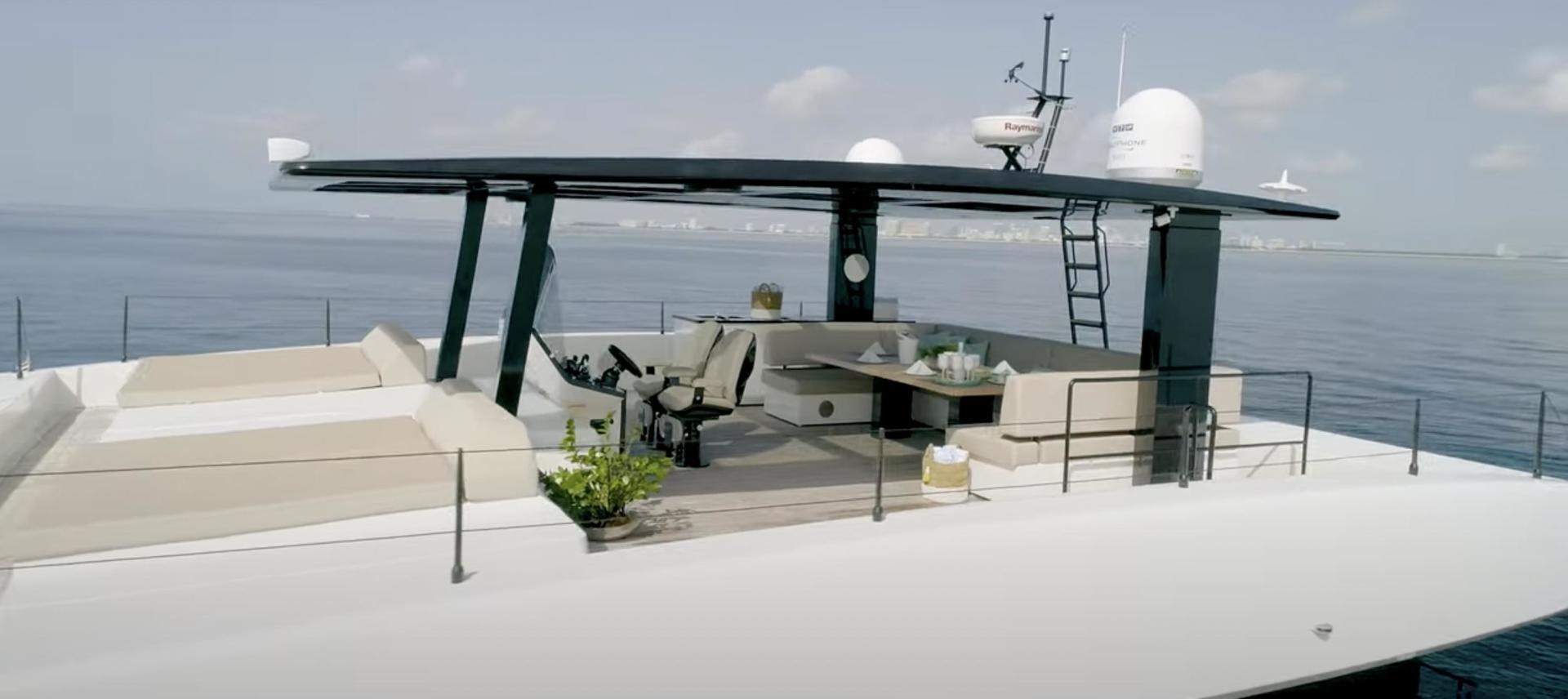 a large grey boat on a dock aboard ROCK STAR 2.0 Yacht for Sale