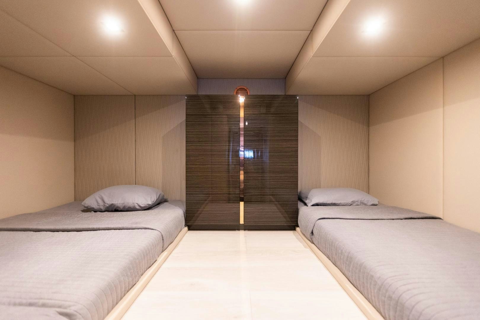 a room with two beds aboard ROCK STAR 2.0 Yacht for Sale