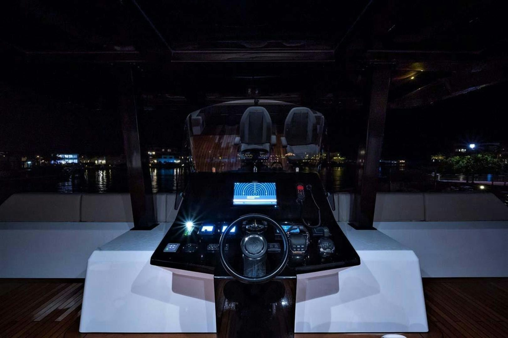 a black and silver electronic device on a table aboard ROCK STAR 2.0 Yacht for Sale