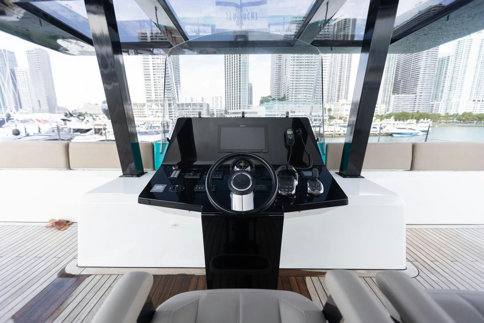 a black speaker on a table aboard ROCK STAR 2.0 Yacht for Sale