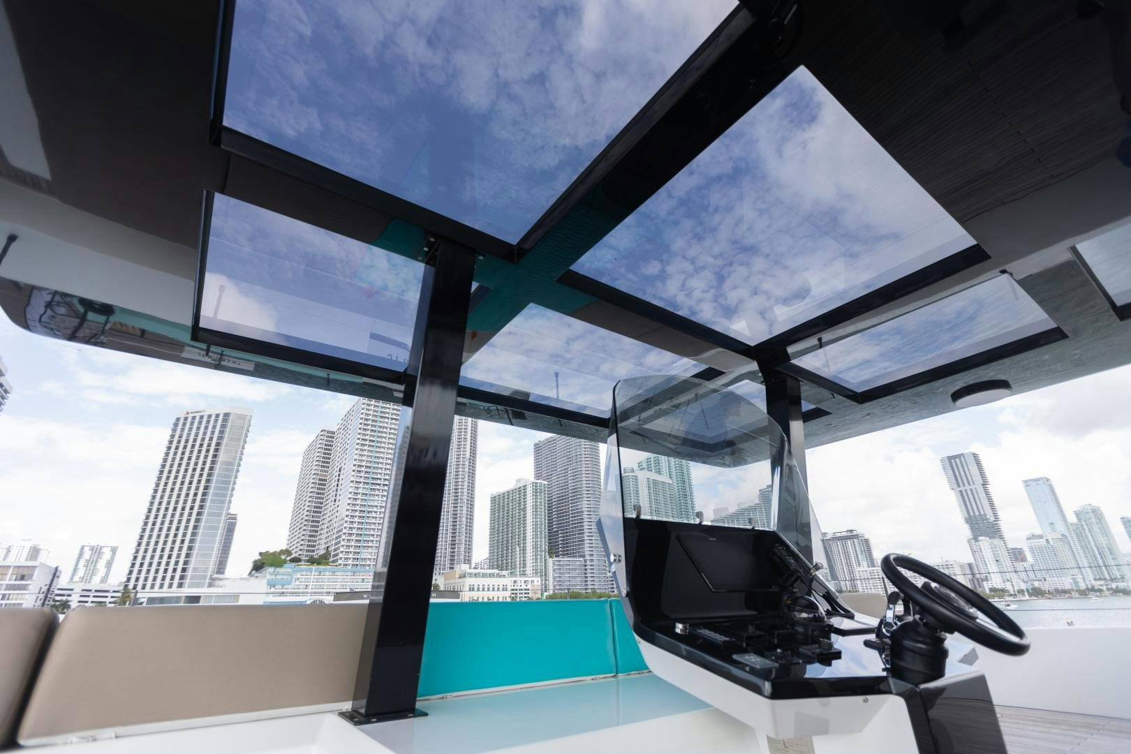 a room with a large window and a couple of computers aboard ROCK STAR 2.0 Yacht for Sale