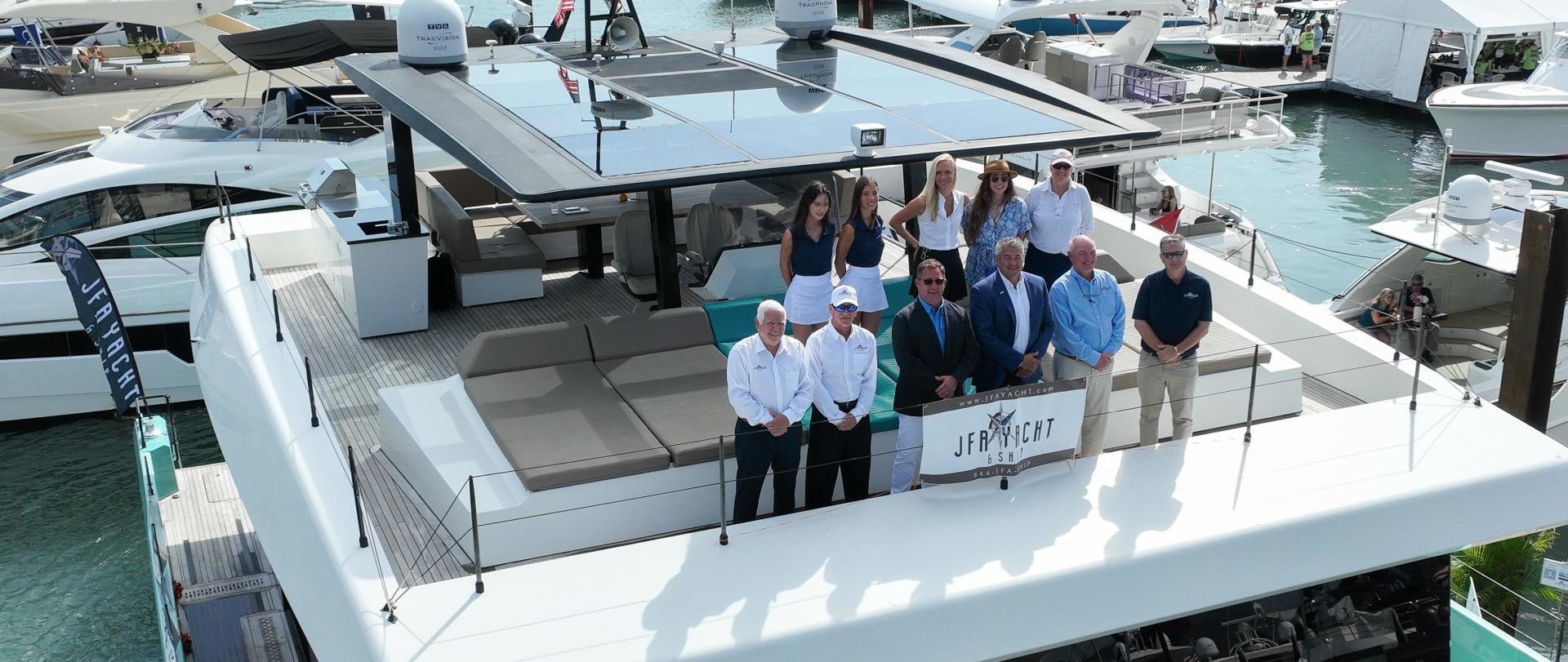 a group of people standing in a building aboard ROCK STAR 2.0 Yacht for Sale