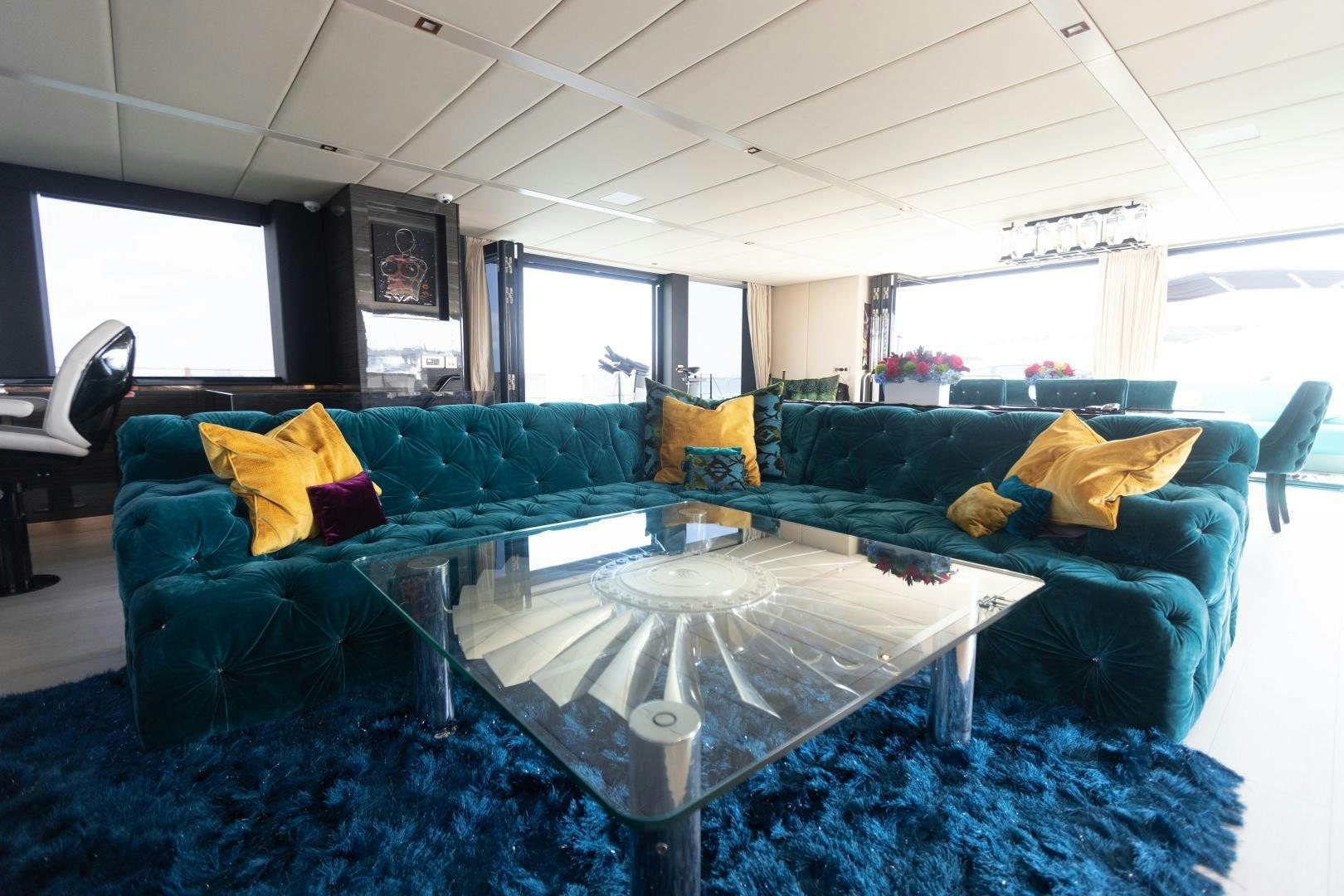 a living room with a couch and a table aboard ROCK STAR 2.0 Yacht for Sale