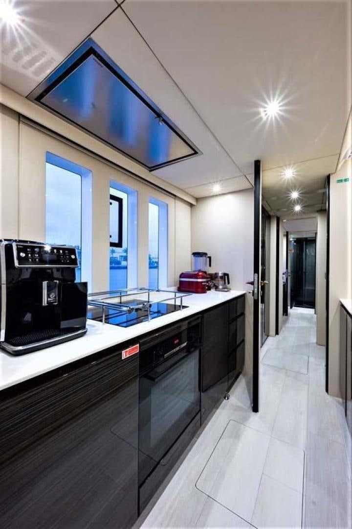 a kitchen with a large oven aboard ROCK STAR 2.0 Yacht for Sale