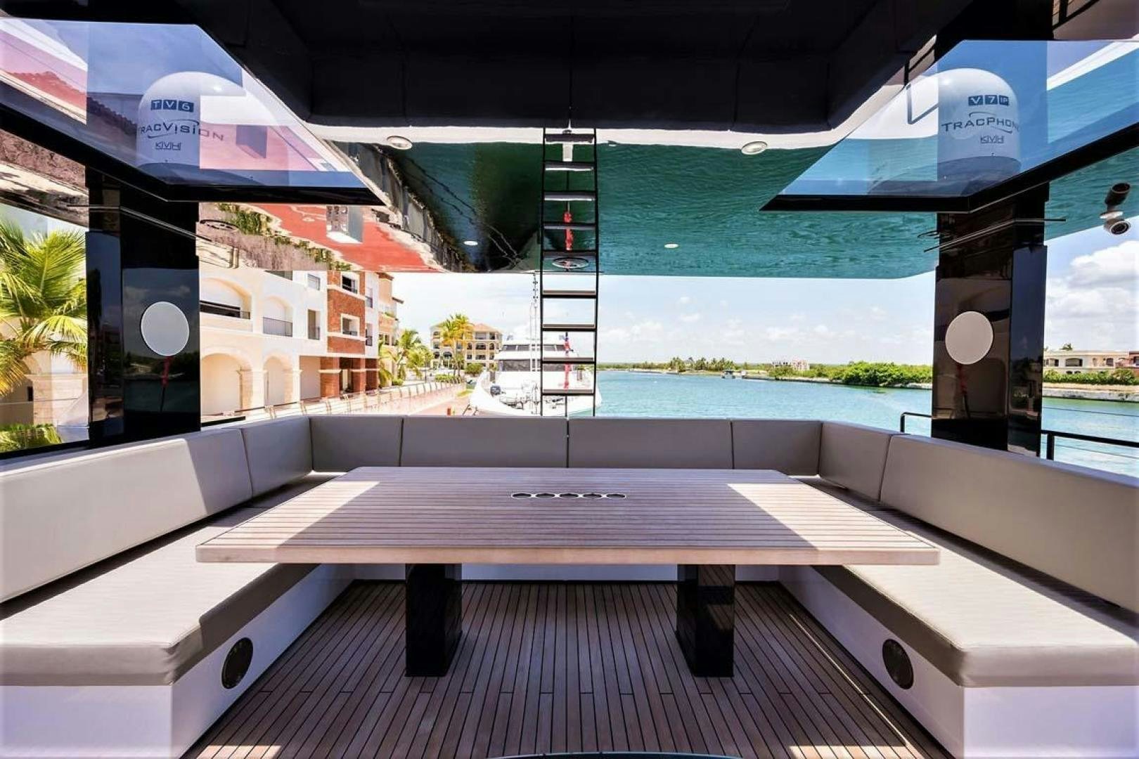 a table on a deck aboard ROCK STAR 2.0 Yacht for Sale