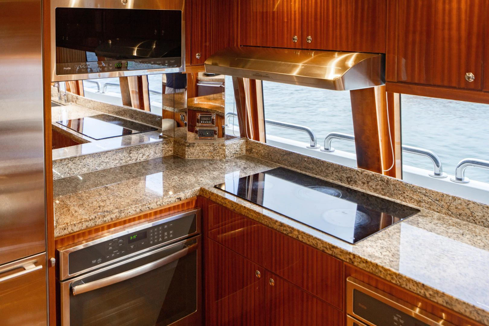 a kitchen with a stainless steel oven aboard RENAISSANCE Yacht for Sale