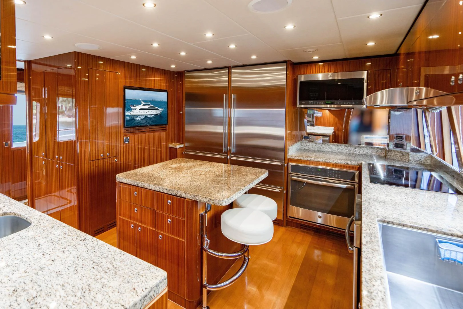 a kitchen with a large island aboard RENAISSANCE Yacht for Sale