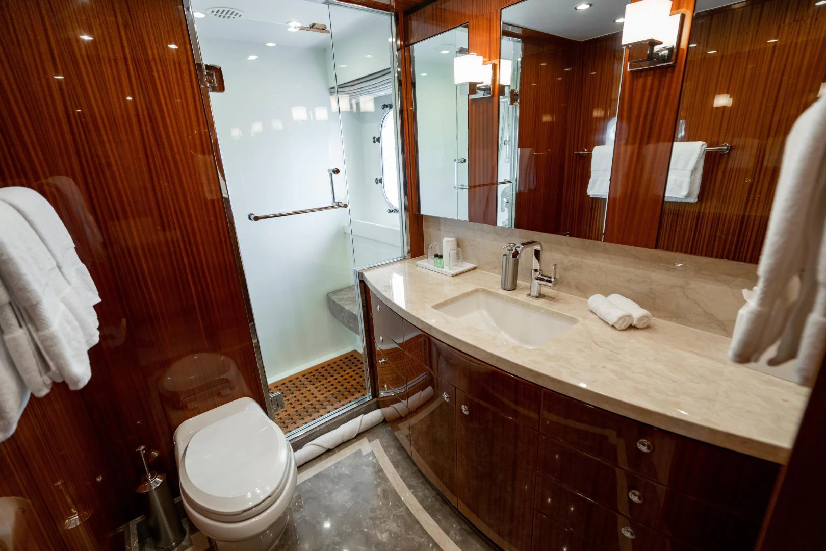 a bathroom with a sink and a toilet aboard RENAISSANCE Yacht for Sale