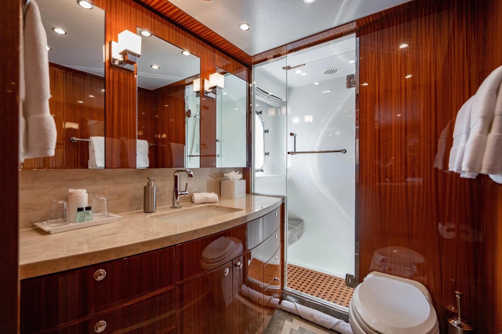 a bathroom with a large mirror aboard RENAISSANCE Yacht for Sale