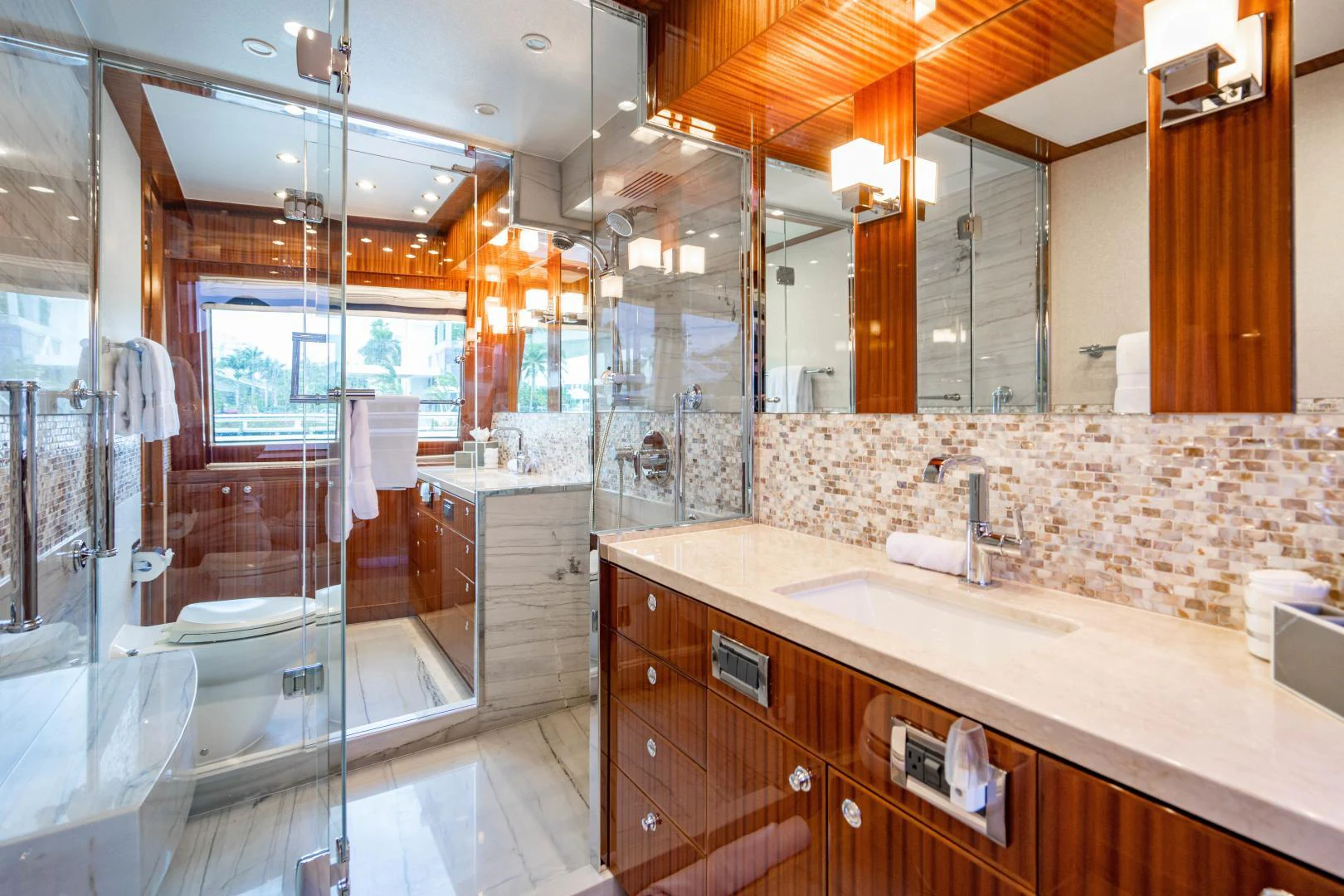 a bathroom with a large mirror aboard RENAISSANCE Yacht for Sale