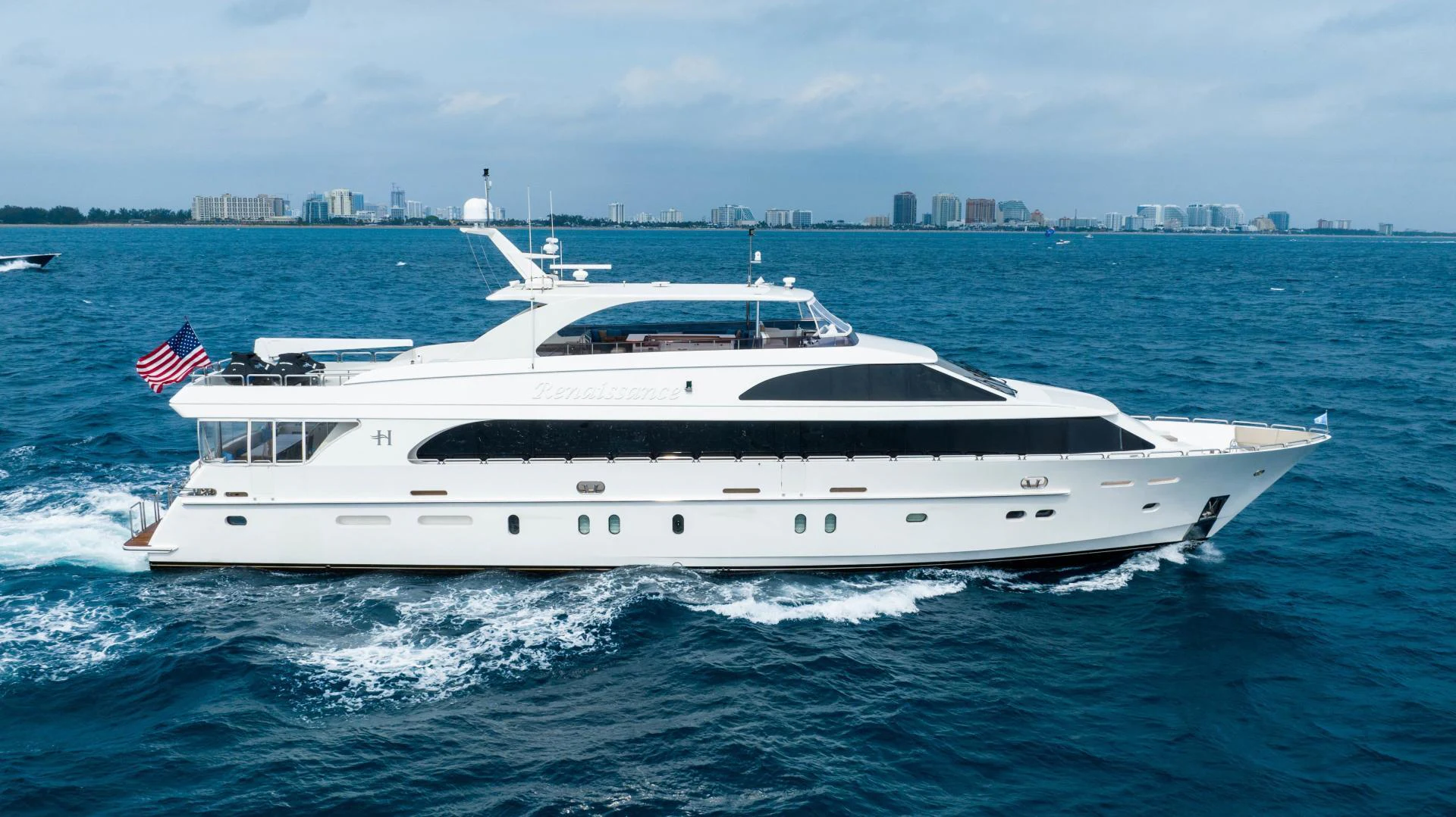 a white yacht on the water aboard RENAISSANCE Yacht for Sale