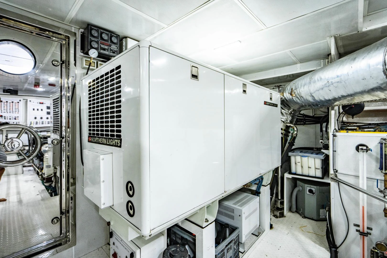 a large machine in a room aboard RENAISSANCE Yacht for Sale