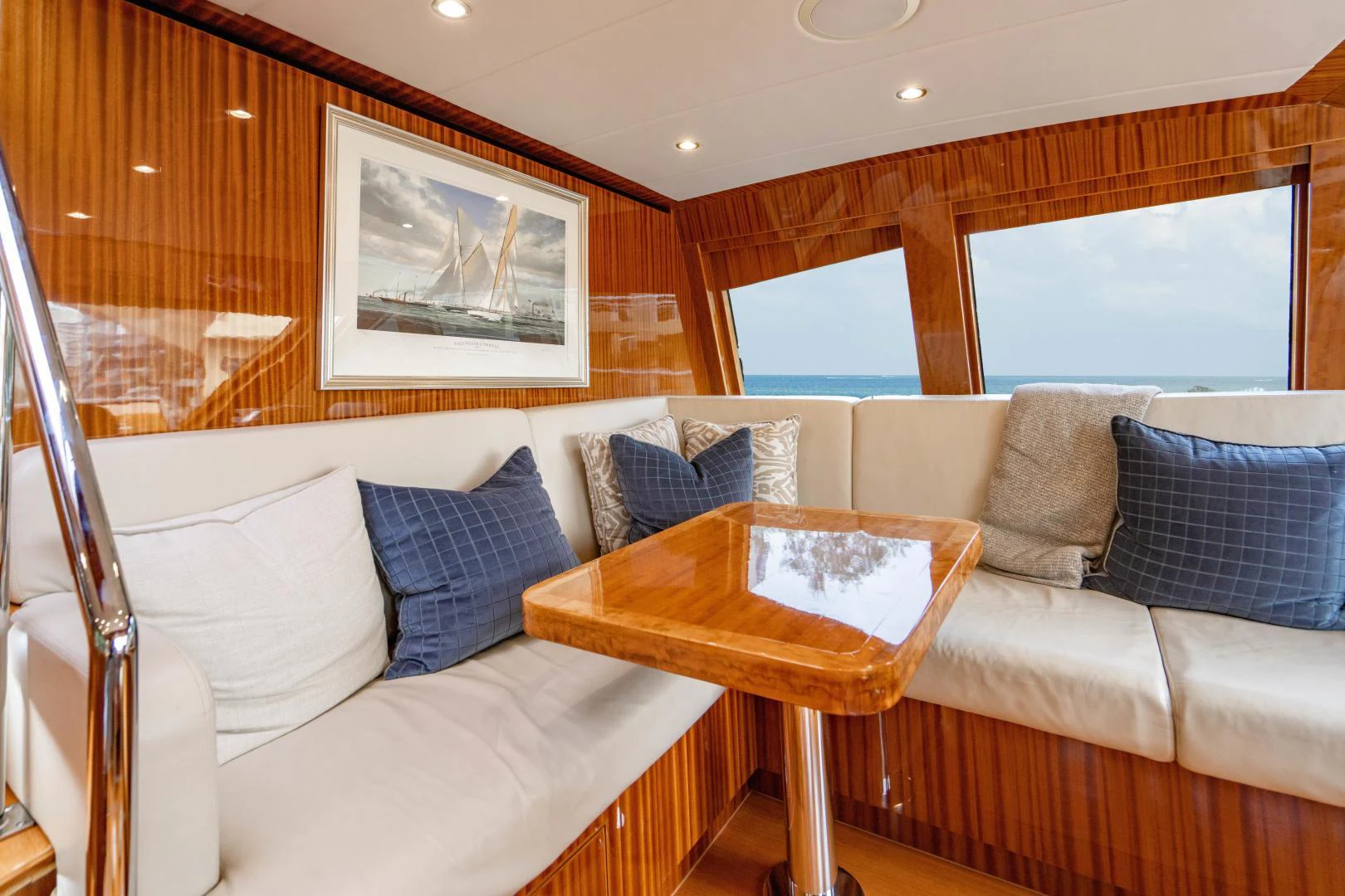 a living room with a couch and a table aboard RENAISSANCE Yacht for Sale