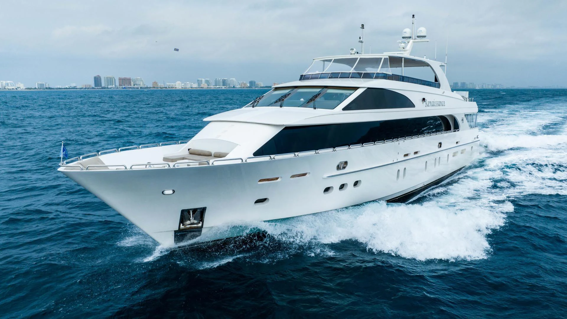 a white yacht on the water aboard RENAISSANCE Yacht for Sale