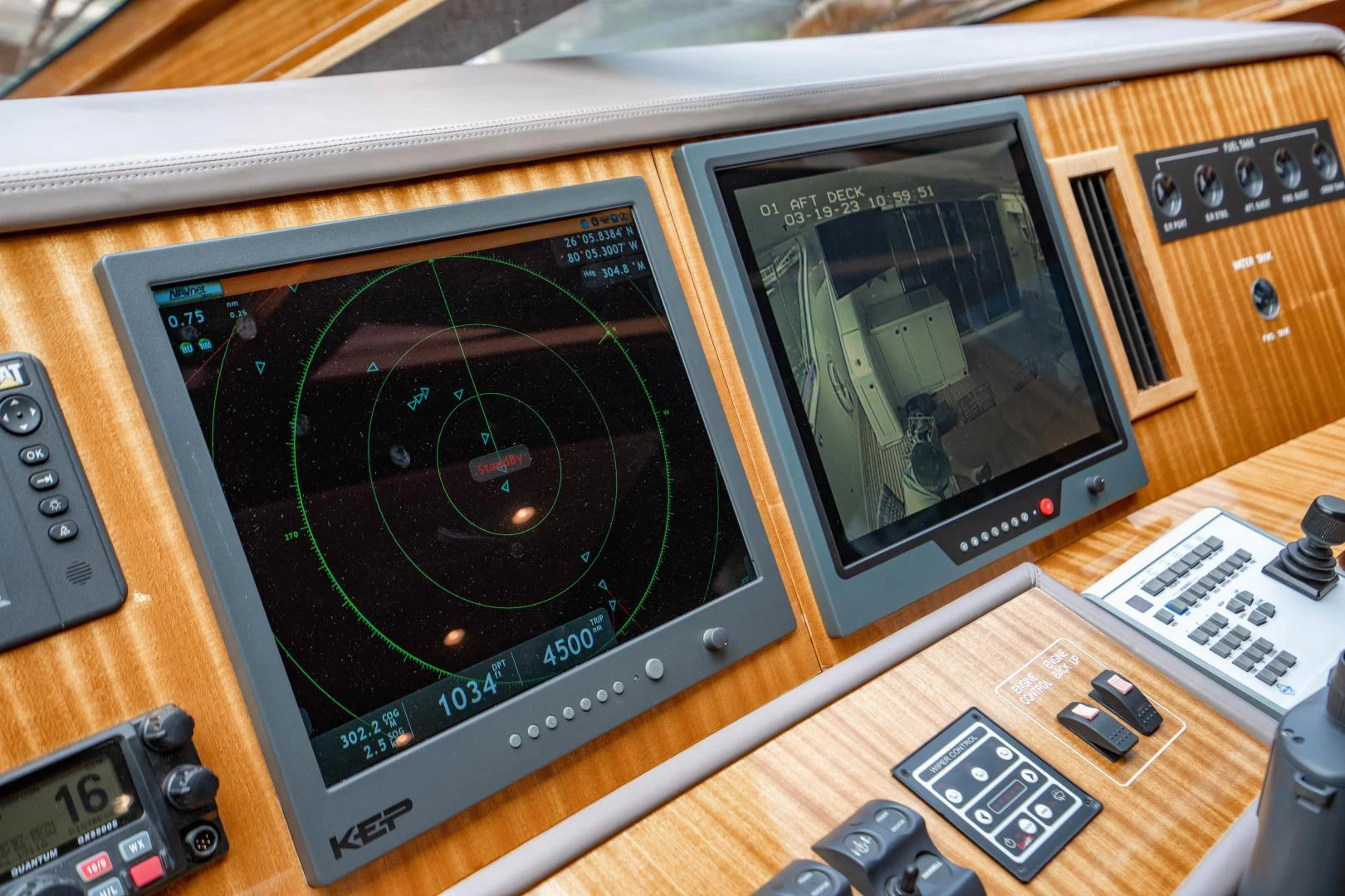 a computer on a table aboard RENAISSANCE Yacht for Sale