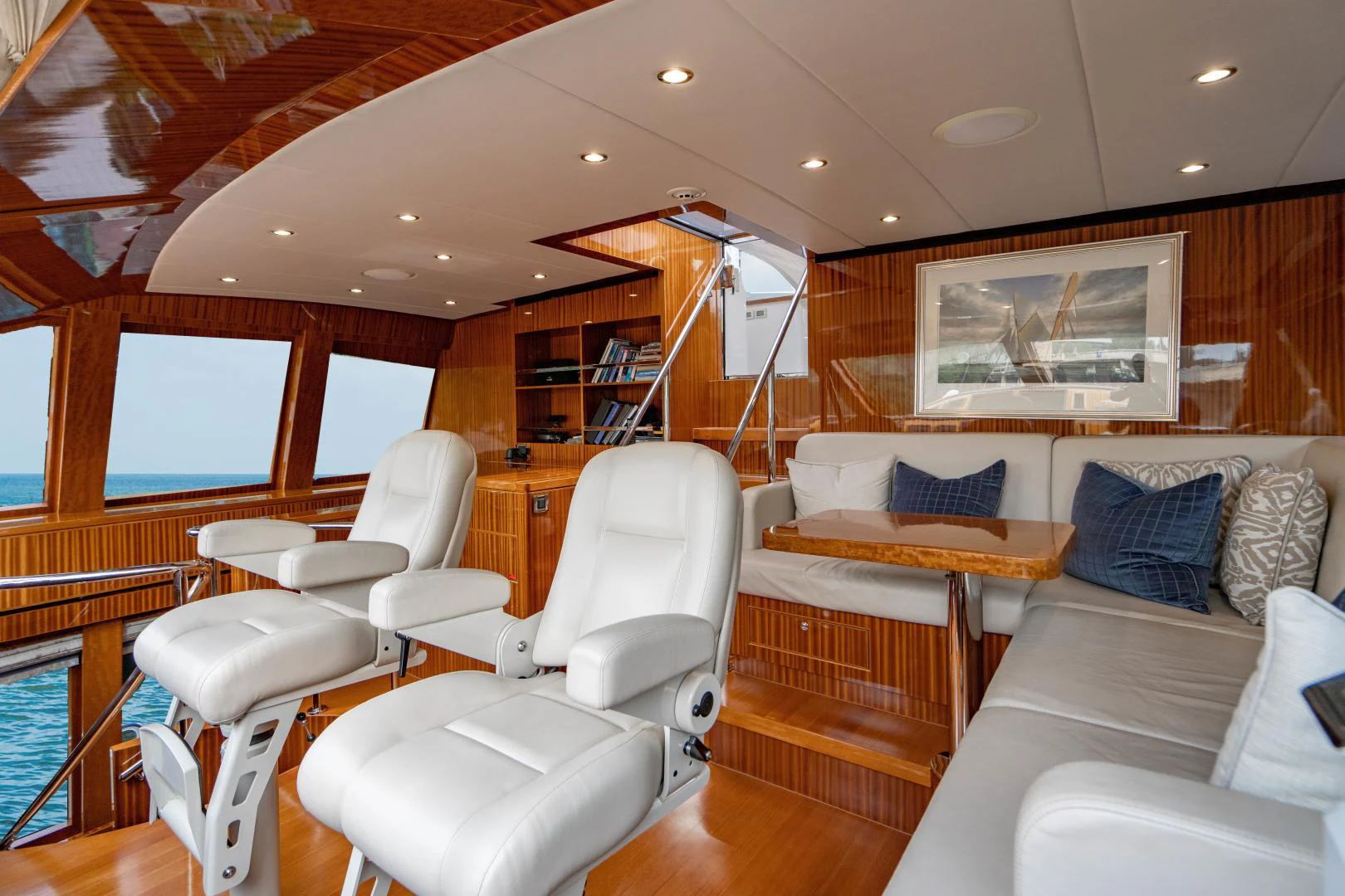 a living room with a couch and a table aboard RENAISSANCE Yacht for Sale