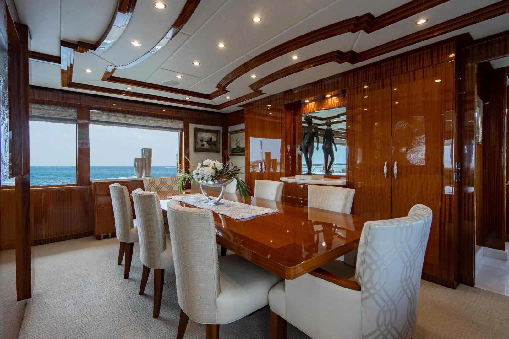 a dining room with a table and chairs aboard RENAISSANCE Yacht for Sale