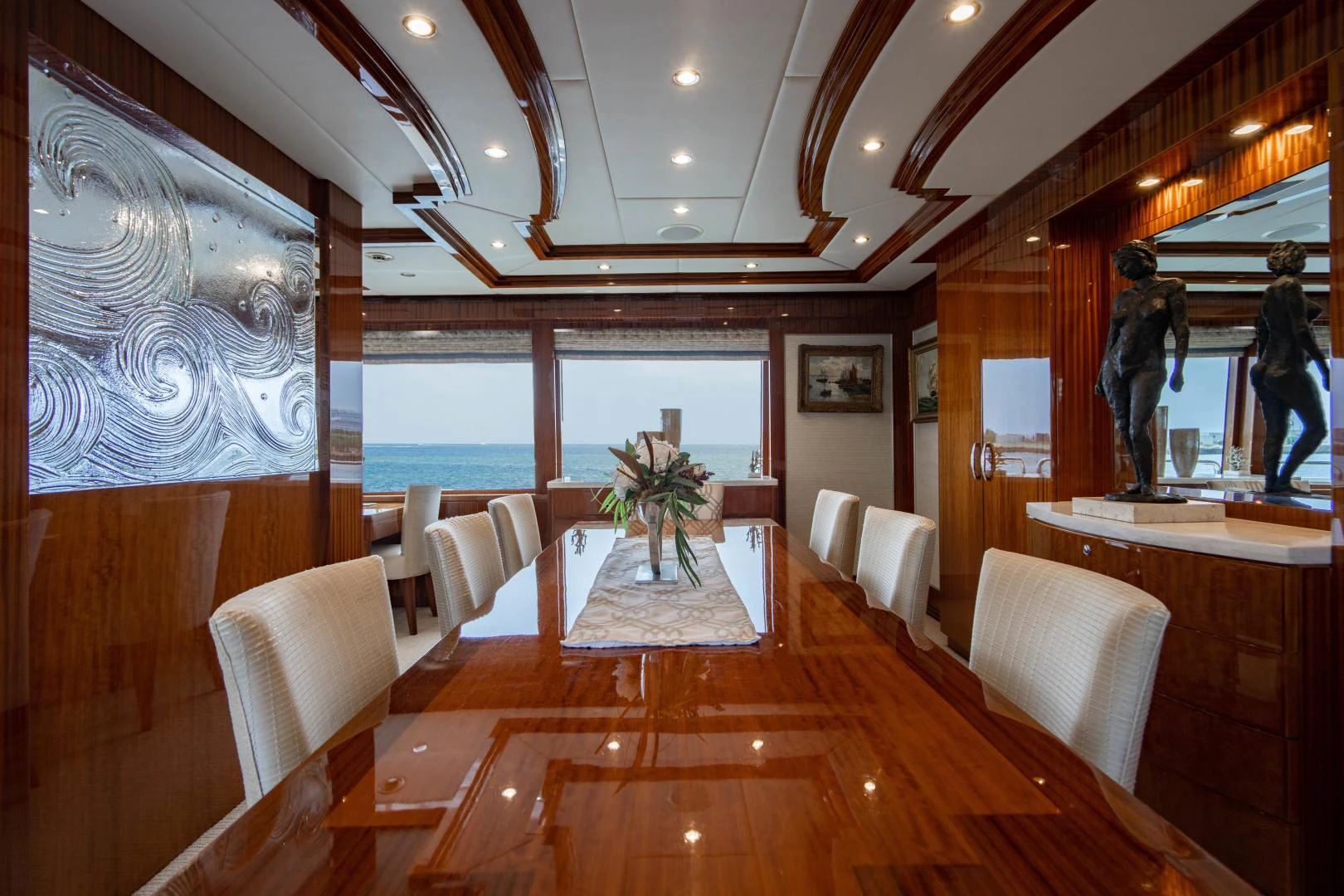 a room with a wood floor and a large window with a wood floor aboard RENAISSANCE Yacht for Sale