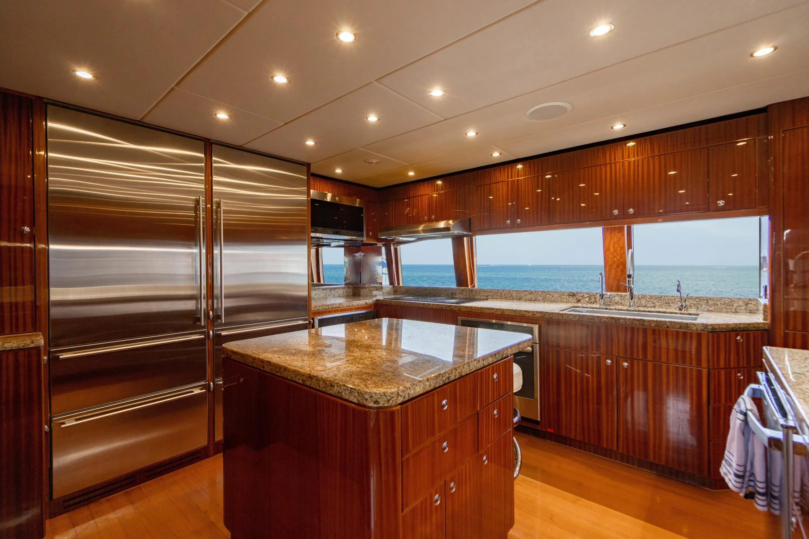 a kitchen with a large glass window aboard RENAISSANCE Yacht for Sale