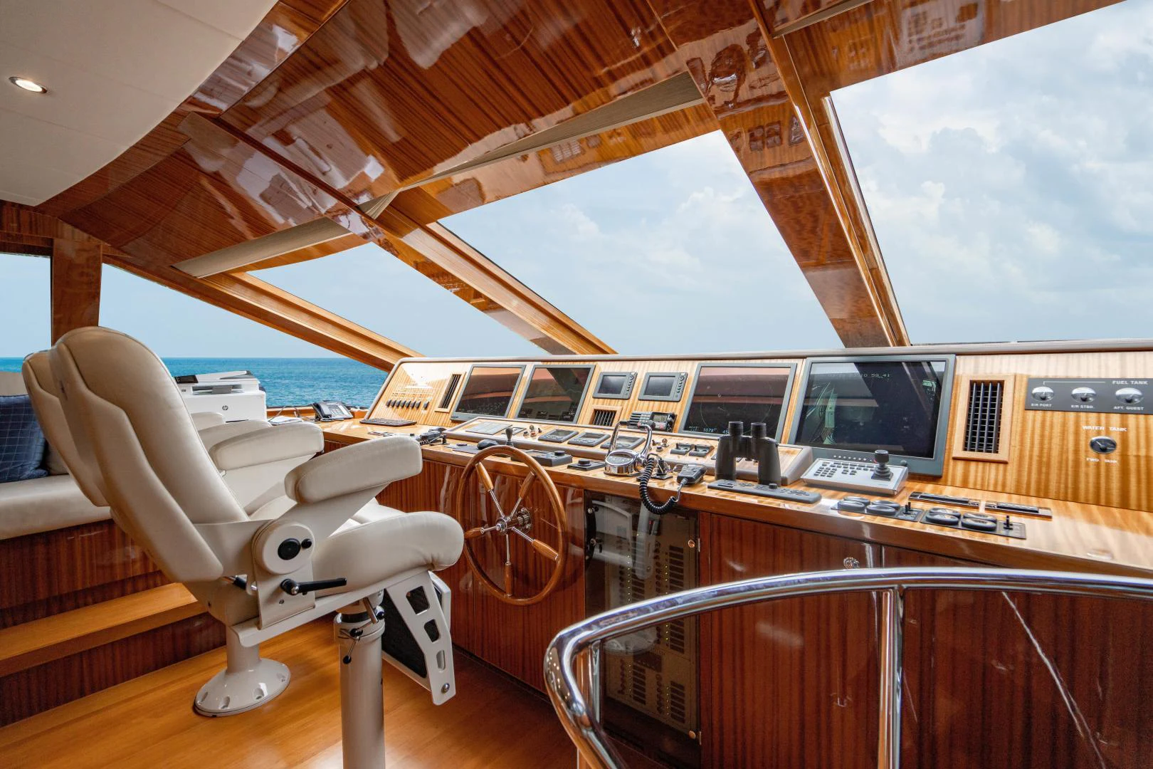a room with a desk and a chair aboard RENAISSANCE Yacht for Sale